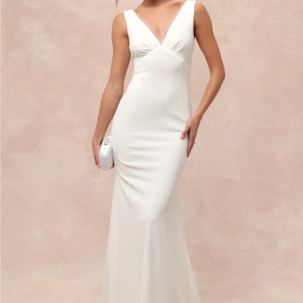 Lulu's Captivating Promise Wedding Gown